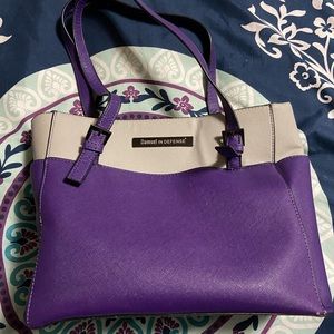 Damsel in defense carry purse.